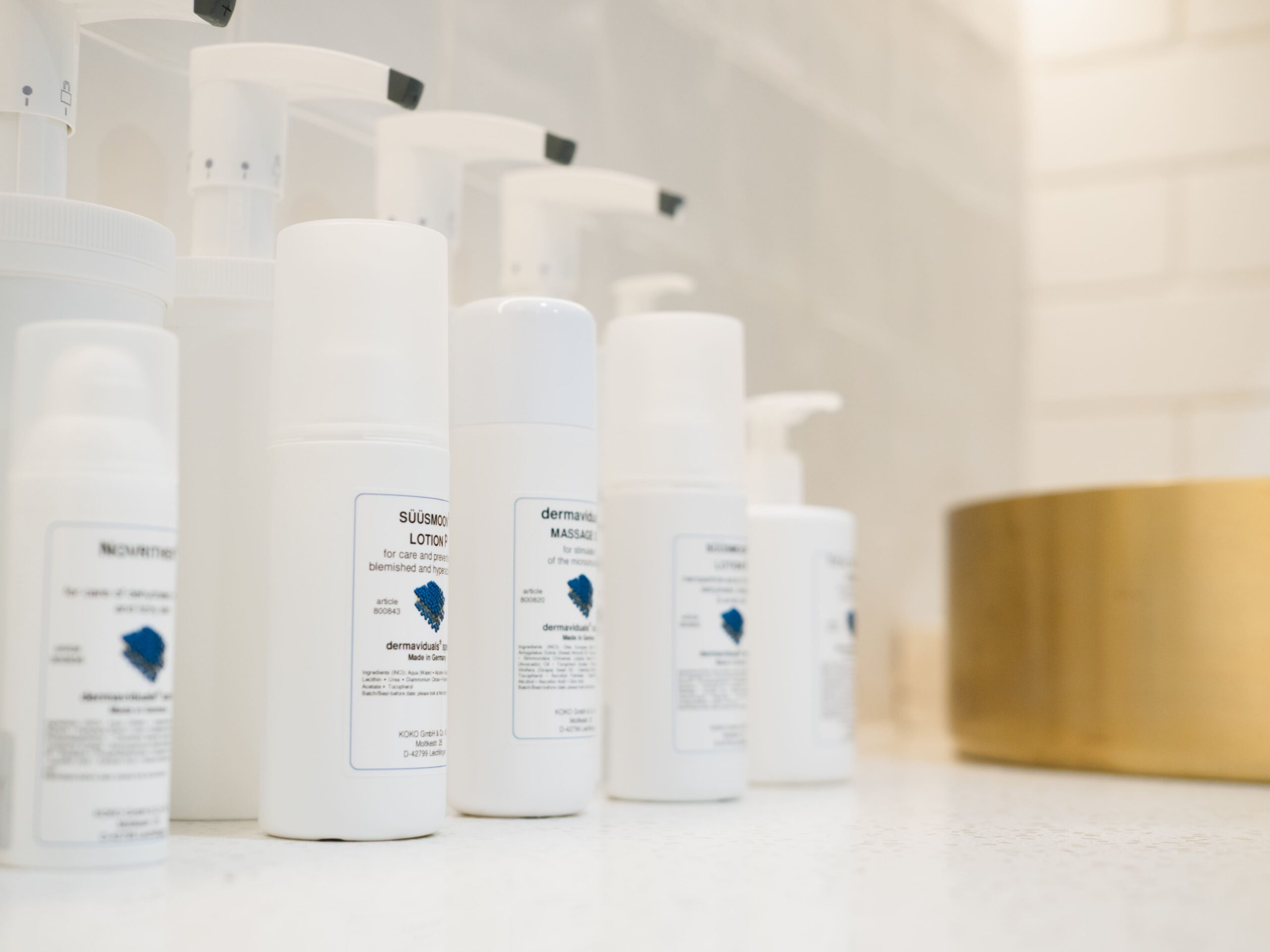 professional sized dermaviduals products lined up on our treatment room bench